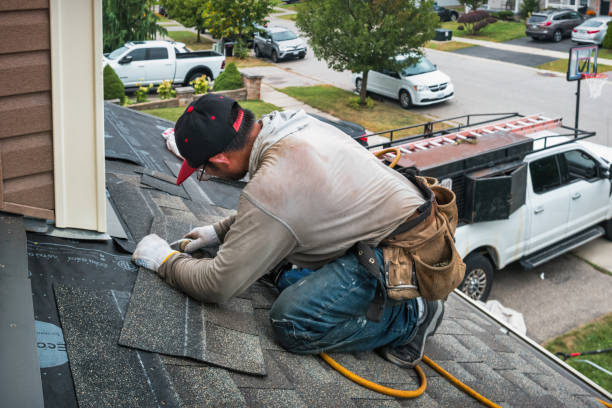 Professional Roofing technician working in Byers, CO
